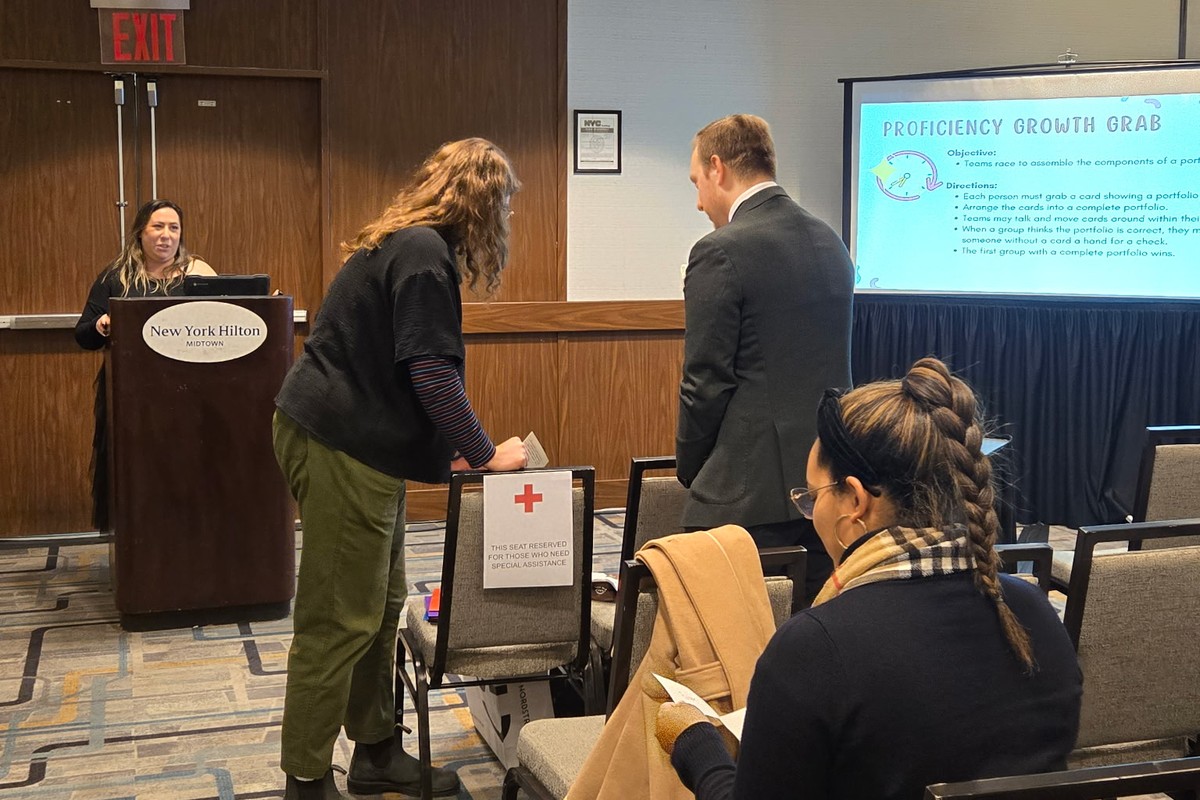 Traci Dougherty facilitating an interactive proficiency portfolio workshop