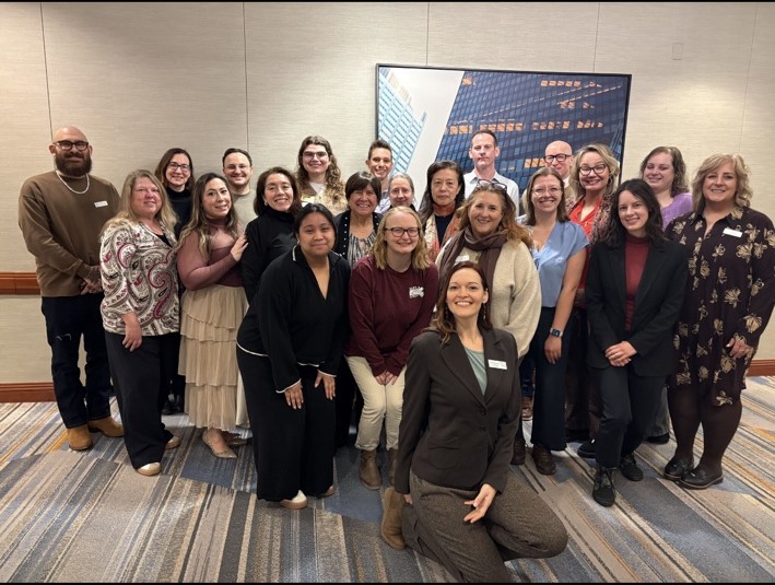 A cohort of language education professionals gathered at a conference