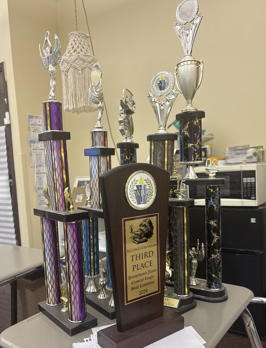 A group of student-organization trophies and awards